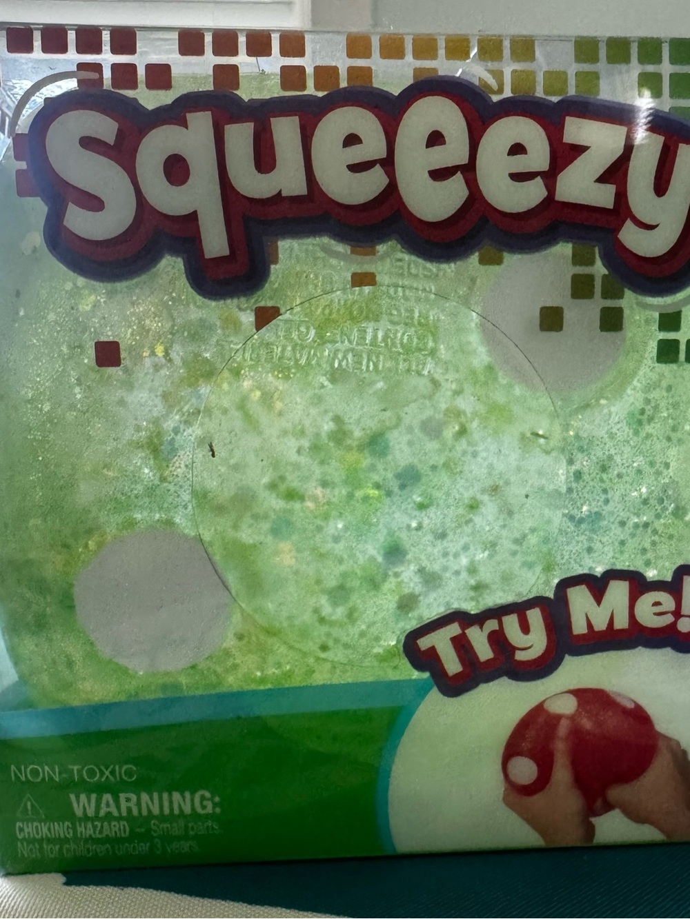 Squeeezy green dice squishy